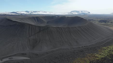 Aerial-pan-shot-of-the-black-Hverfell-vulcano-in-Iceland-near-Myvatn