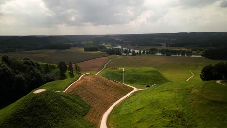 aerial-shot-of-mounds-and-archaeological-site-in-Kernave,-Lithuania
