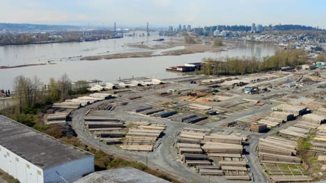 Stocks-Of-Cut-Woods-In-A-Wood-Production-Industry-On-The-Bank-Of-Fraser-River-In-New-Westminster,-BC,-Canada