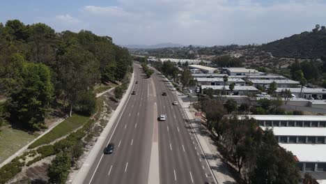 Aerial-view-of-oceanside-Boulevard,-cars-driving-down-the-road