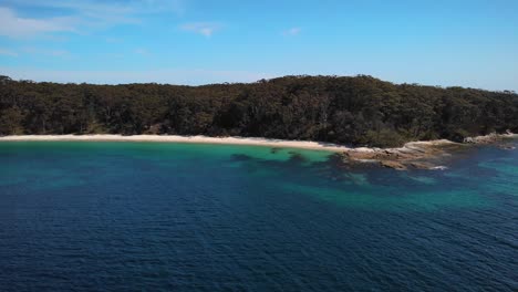 Panoramic-Aerial-view-of-the-Murrays-Beach,-in-sunny-Jervis-bay,-NSW,-Australia