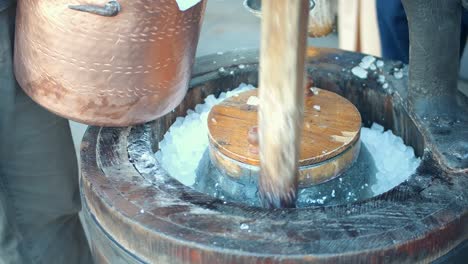 Pouring-And-Breaking-Ice-Cubes-In-Vintage-Ice-Cream-Machine