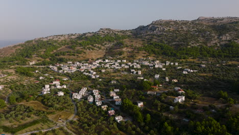 Quaint-Pilonas-village-amongst-olive-groves-in-Pilonas,-Greece