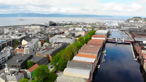 Aerial:-Trondheim-and-Nidelva-River,-Noraway.-Pan