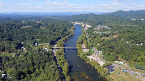 Aerial-View-Of-Old-Leicester-Highway-Bridge-Over-The-French-Board-River-In-Asheville,-North-Carolina,-United-States