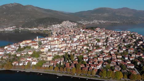 Aerial-Pull-Back-Shot-in-Kastoria-Greece-at-Dawn,-4K-Footage
