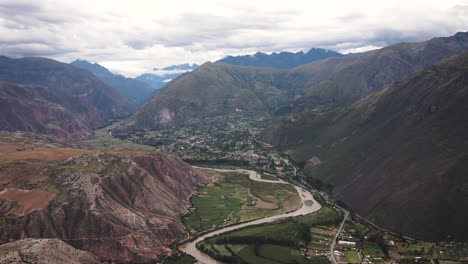 Beautiful-drone-shot-of-a-green-valley-in-the-highlands-of-Cuzco-Peru