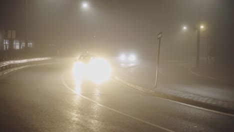 Cars-On-The-Foggy-Road-During-Night-Hours---wide