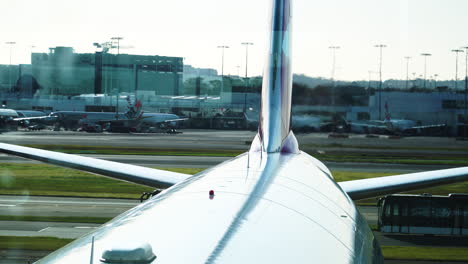 Close-up-of-a-commercial-plane-warming-up-in-Sydney-airport