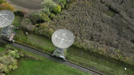 Aerial-orbit-view-Mullard-radio-observatory-telescope-array-MRAO-in-Cambridge-countryside