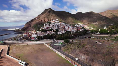 Aerial-of-exotic-town-San-Andres-with-colorful-house-on-mountain-coast