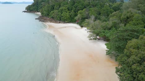Aerial-drone-shot-of-Pasir-Tengkorak-sandy-beach,-Langkawi,-Malaysia