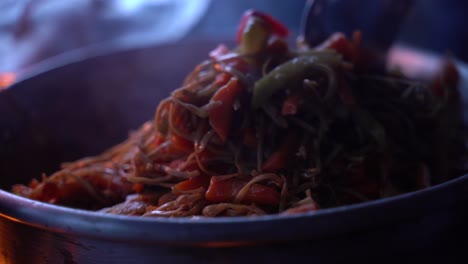 Mixing-the-noodles-in-the-pan-on-top-of-the-volcano-in-Guatemala
