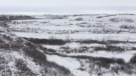 Prairies-in-Alberta,-Canada-frozen-from-a-drone