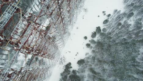 Duga-radar-station-steel-antenna-grid-in-winter-Chernobyl-taiga-forest
