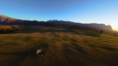 Mountains,-forest-and-fields-filmed-at-Alpe-di-Siusi-in-European-Alps,-Italian-Dolomites-filmed-in-vibrant-colors-at-sunset