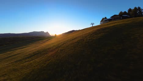 Mountains,-forest-and-fields-filmed-at-Alpe-di-Siusi-in-European-Alps,-Italian-Dolomites-filmed-in-vibrant-colors-at-sunset