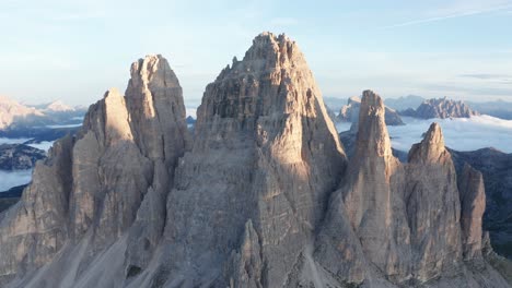 Drone-shot-of-famous-Tre-Cime-Di-Lavaredo-Towers-in-Dolomites-of-Italy-during-Beautiful-sunrise