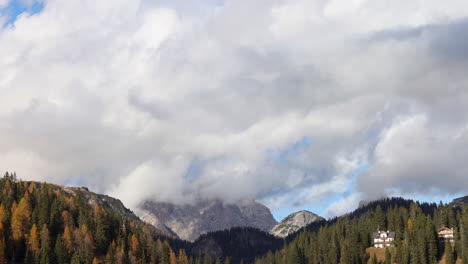 Ethereal-swirling-clouds-around-peaks-of-South-Tyrol-woodland-mountain-wilderness-time-lapse
