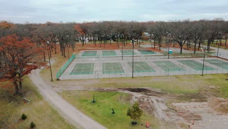Flying-past-Tennis-Courts-in-Muskegon,-MI