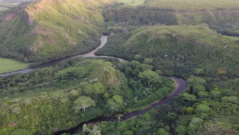 Dramatic-aerial-footage-of-famous-Wailua-River-durig-sunset
