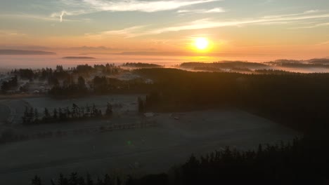Aerial-view-of-Fort-Nugent-Park,-one-of-Washington's-best-frisbee-golf-courses-during-a-cold-winter-sunrise