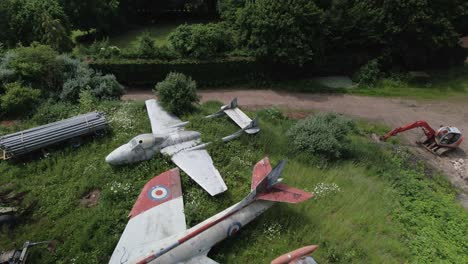 Aerial-approach-to-the-abandoned-De-Havilland-Vampire,-and-F
