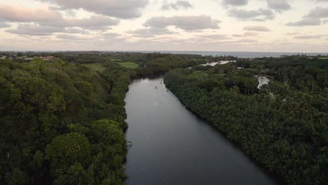 Dramatic-aerial-footage-of-famous-Wailua-River-during-sunset,-sunrise