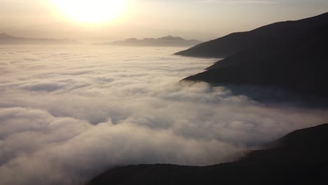 Above-the-clouds-and-the-mountains-of-Lima-Peru-during-an-orange-sunrise