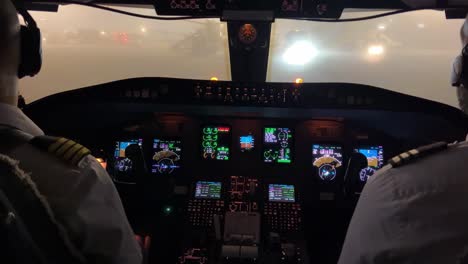 Jet-cockpit-view-from-inside-in-a-heavy-fog-condition-in-the-ramp-before-starting-push-back-maneuver
