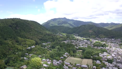 Drone-footage-of-Kyoto-Village-beside-Arashiyama,-Bamboo-Forest,-Japan