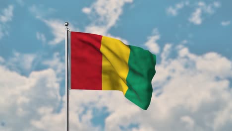Bandera-De-Guinea-Ondeando-En-El-Cielo-Azul-Video-Realista-4k