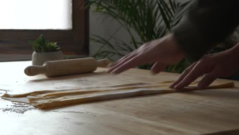 Folding-Fresh-Pasta-Dough,-Homemade-Pasta-Making,-Close-Up