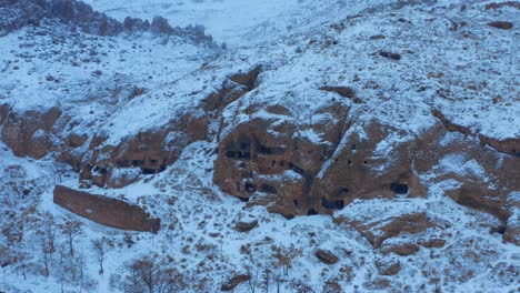 Aerial-view-of-ancient-caves-in-winter.4K.-1