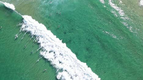 Aerial-View-Of-Surfers-Enjoyed-Riding-Perfect-Waves-At-Bondi-Beach---Surf-Spot-At-Bondi,-NSW,-Australia