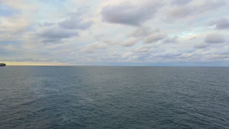 Panorama-Of-Wavy-Ocean-Under-Cloudy-Blue-Sky-In-Australia