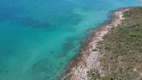 Rugged-Coastline-With-Clear-Blue-Coral-Sea