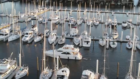 Aerial-View-Of-Yacht-Arrive-At-Marina-After-Cruising-In-The-Ocean