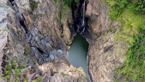 Aerial---waterfall-creates-hidden-lagoon