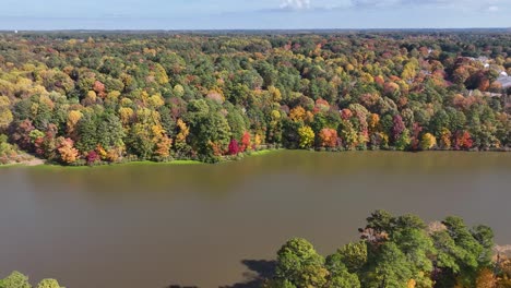 Fall-autumn-leaves-over-Lake-Lynn-Raleigh-NC-pan-left