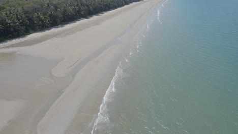 White-Sand-And-Turquoise-Water-At-Four-Mile-Beach-In-Port-Douglas,-Queensland,-Australia---aerial-drone-shot