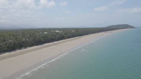 Port-Douglas-Four-Mile-Beach-And-Ocean-On-A-Sunny-Day,-North-Queensland,-Australia---aerial-drone-shot