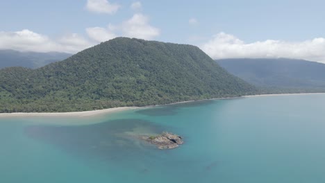 Struck-Island-By-Calm-Blue-Sea-With-Green-Mountain---Thornton-Beach-Within-Daintree-National-Park-In-QLD,-Australia