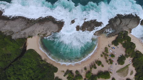 Overhead-Drone-shot-of-Mar-Chiquita-Beach-flying-down-4K
