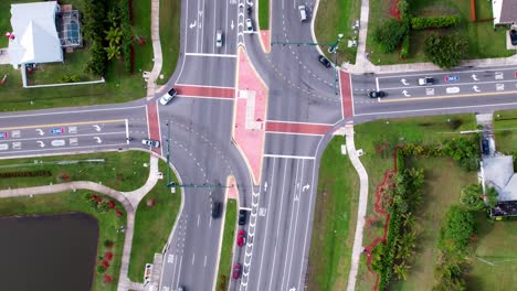 Drone-time-lapse-of-traffic-straight-down-at-the-intersection-of-Floresta-and-Crosstown-Parkway-in-Port-Saint-Lucie-Florida