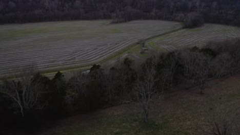 A-dolly-tilt-shot-revealing-some-Kentucky-farmland-and-sunset-next-to-the-Kentucky-river-4k