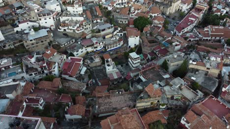 Flying-the-drone-in-the-center-of-Taxco,-Mexico
