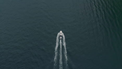 Aerial-view-of-a-motor-boat-in-the-distance