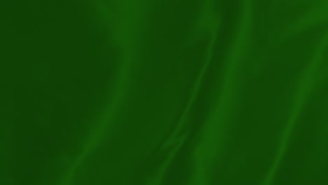 Green-Fabric-in-motion.-Abstract-Background