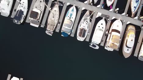 Aerial-shot-of-boats-docking-in-harbor